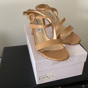 Beautiful 3 1/2” beige Jimmy Choo sandals